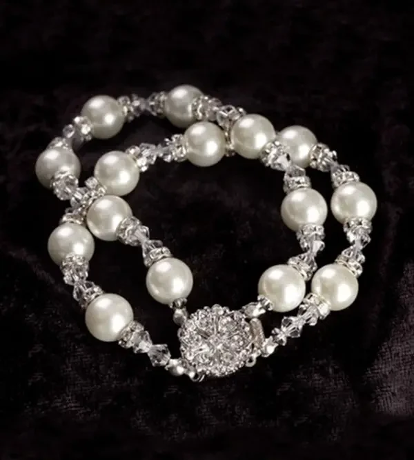 image shows a bridal pearl and crystal bracelet